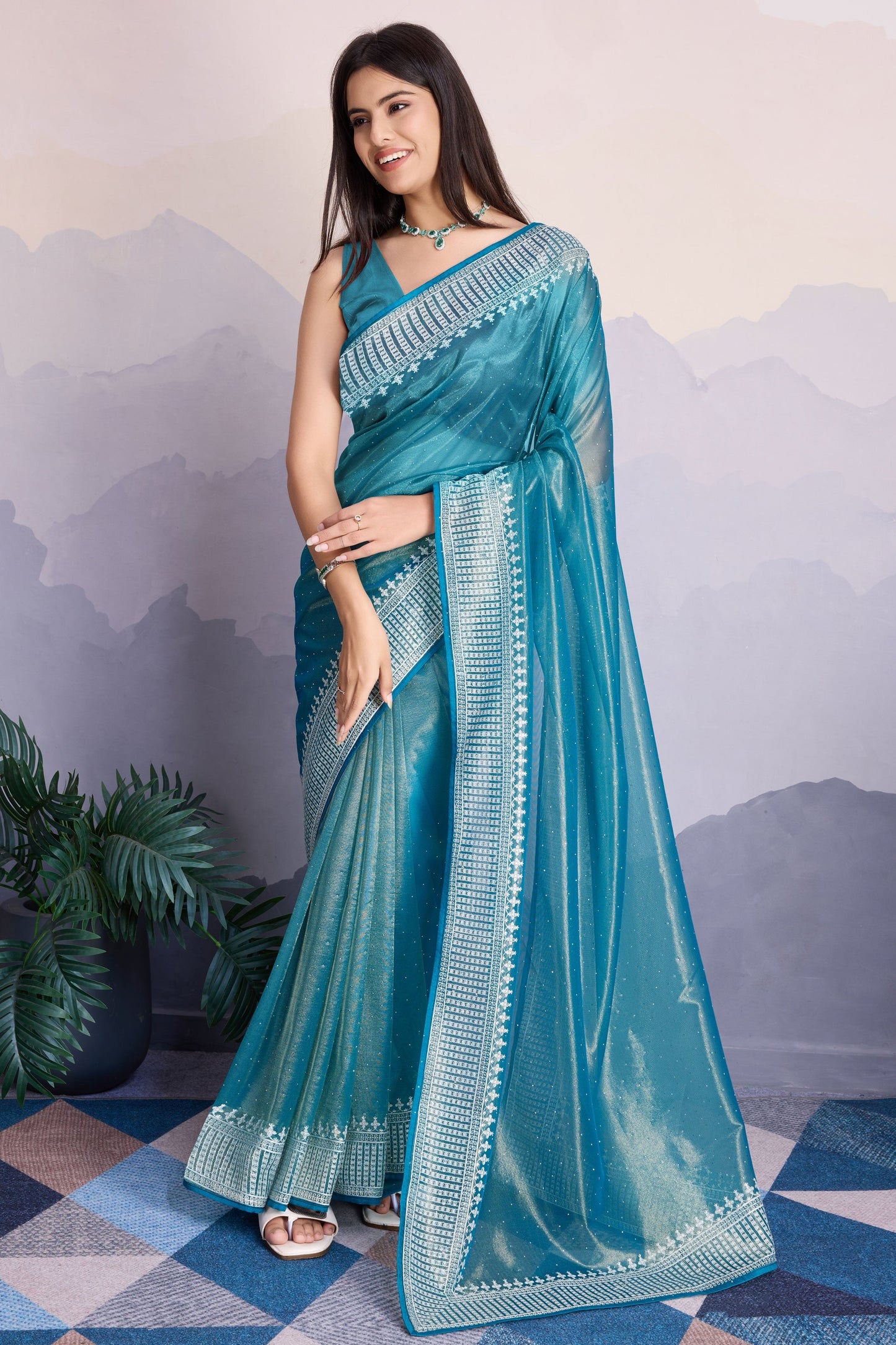 blue-embroidered-net-saree-zb132820_1_SareeButa.com