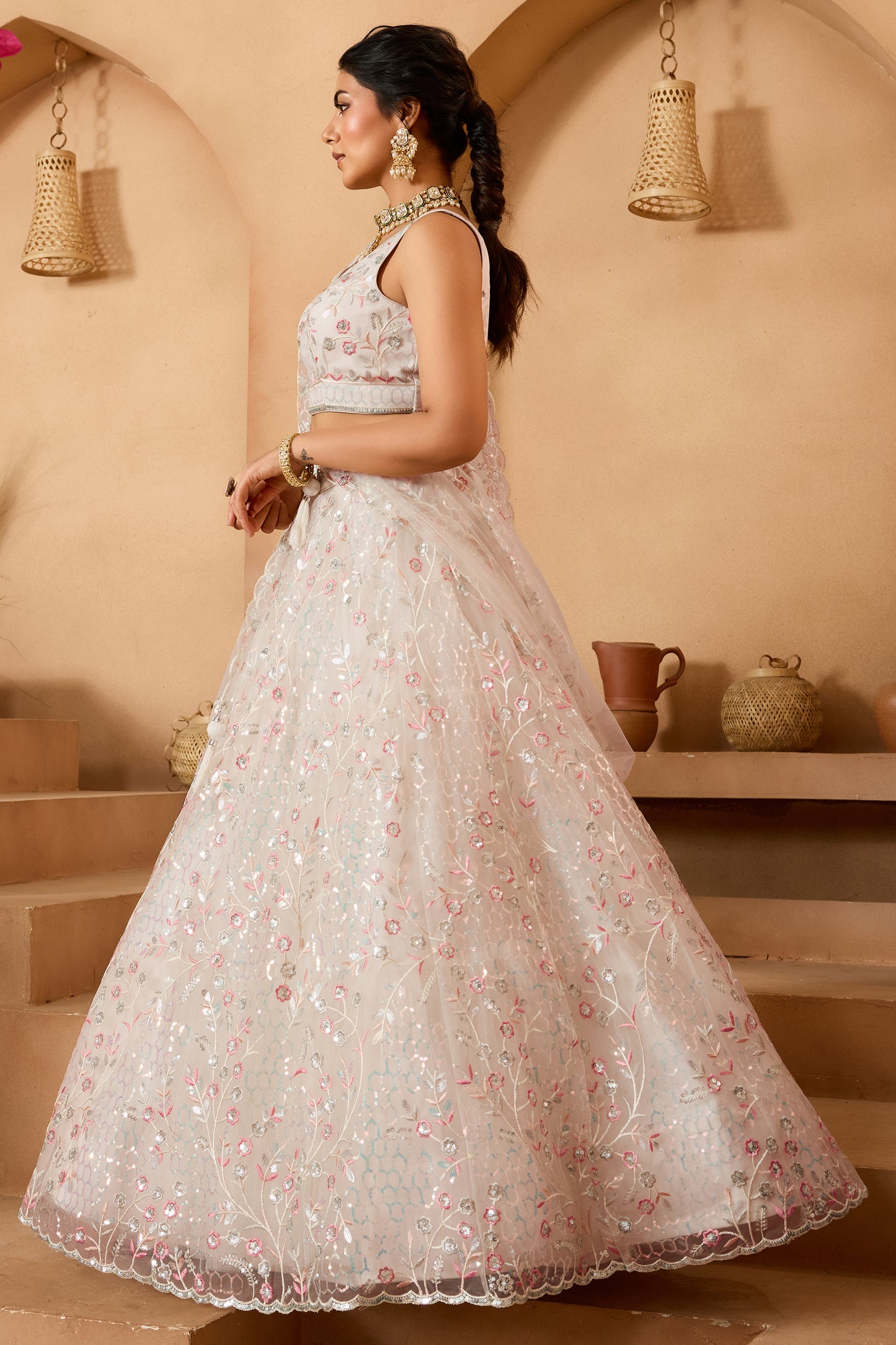 Off White Semi-Stitched Embroidered Net Lehenga