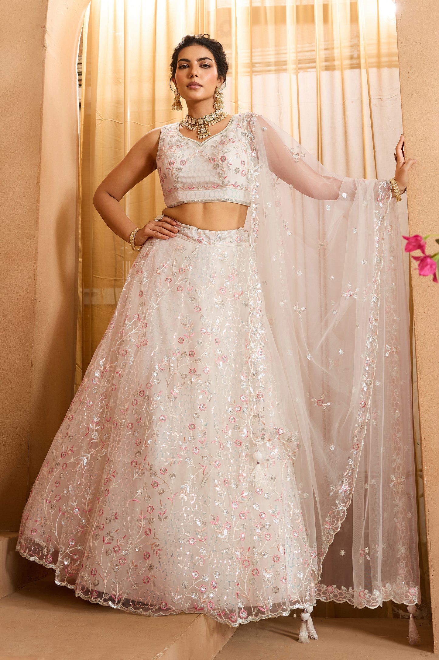 Off White Semi-Stitched Embroidered Net Lehenga