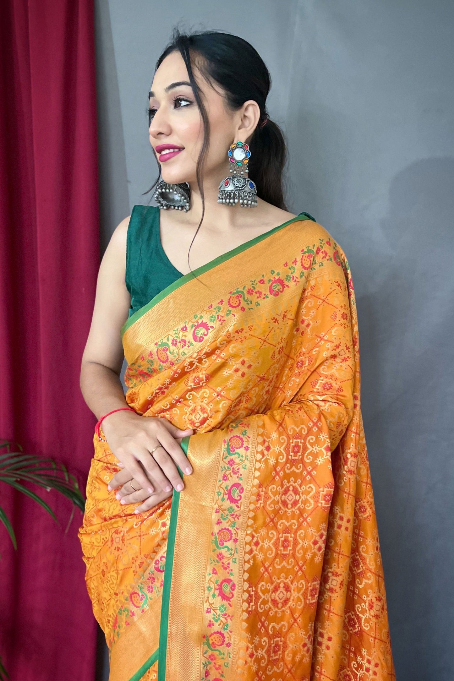 orange-patola-silk-saree-zb131628_2_SareeButa.com