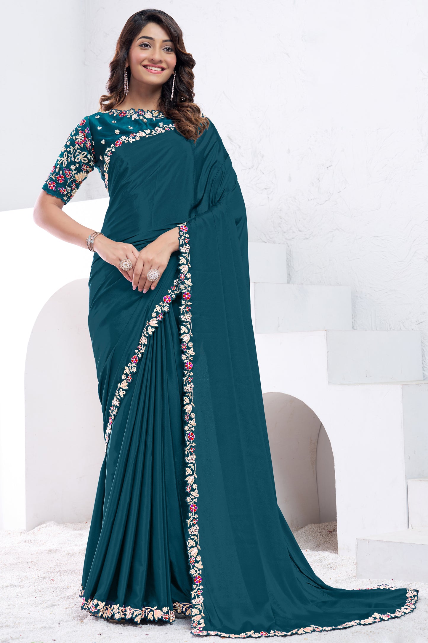 Teal Embroidered Crepe Silk Saree