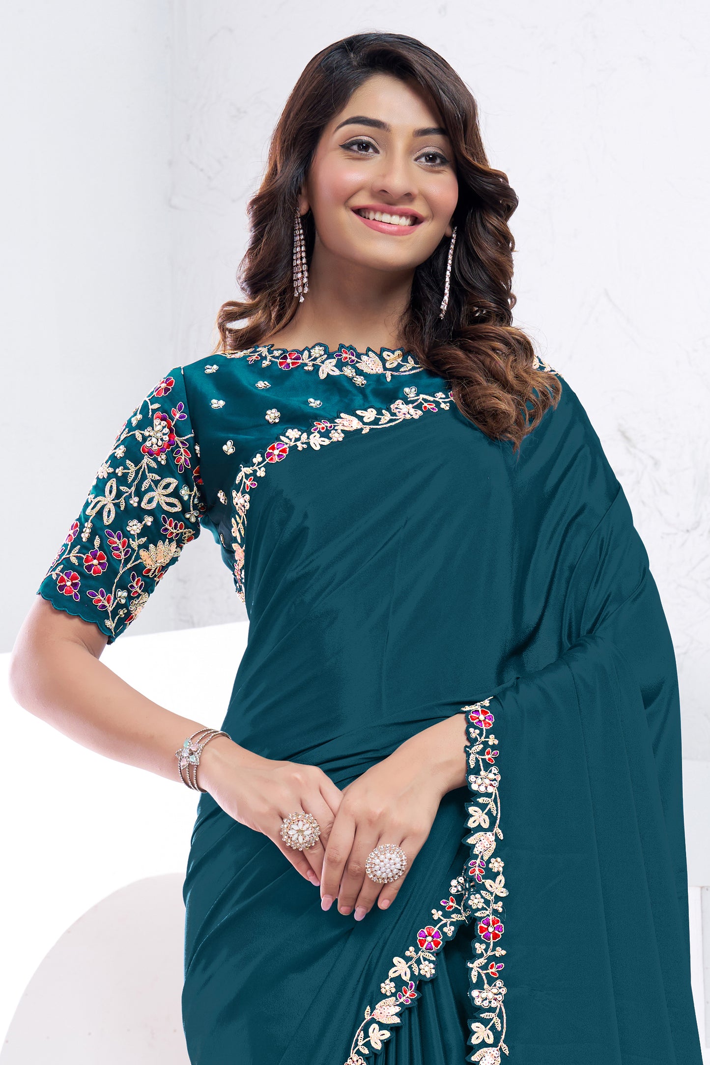 Teal Embroidered Crepe Silk Saree