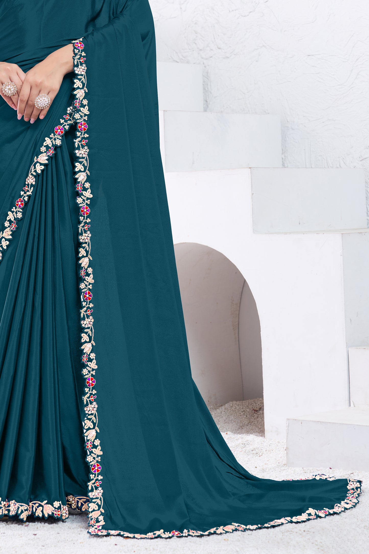 Teal Embroidered Crepe Silk Saree