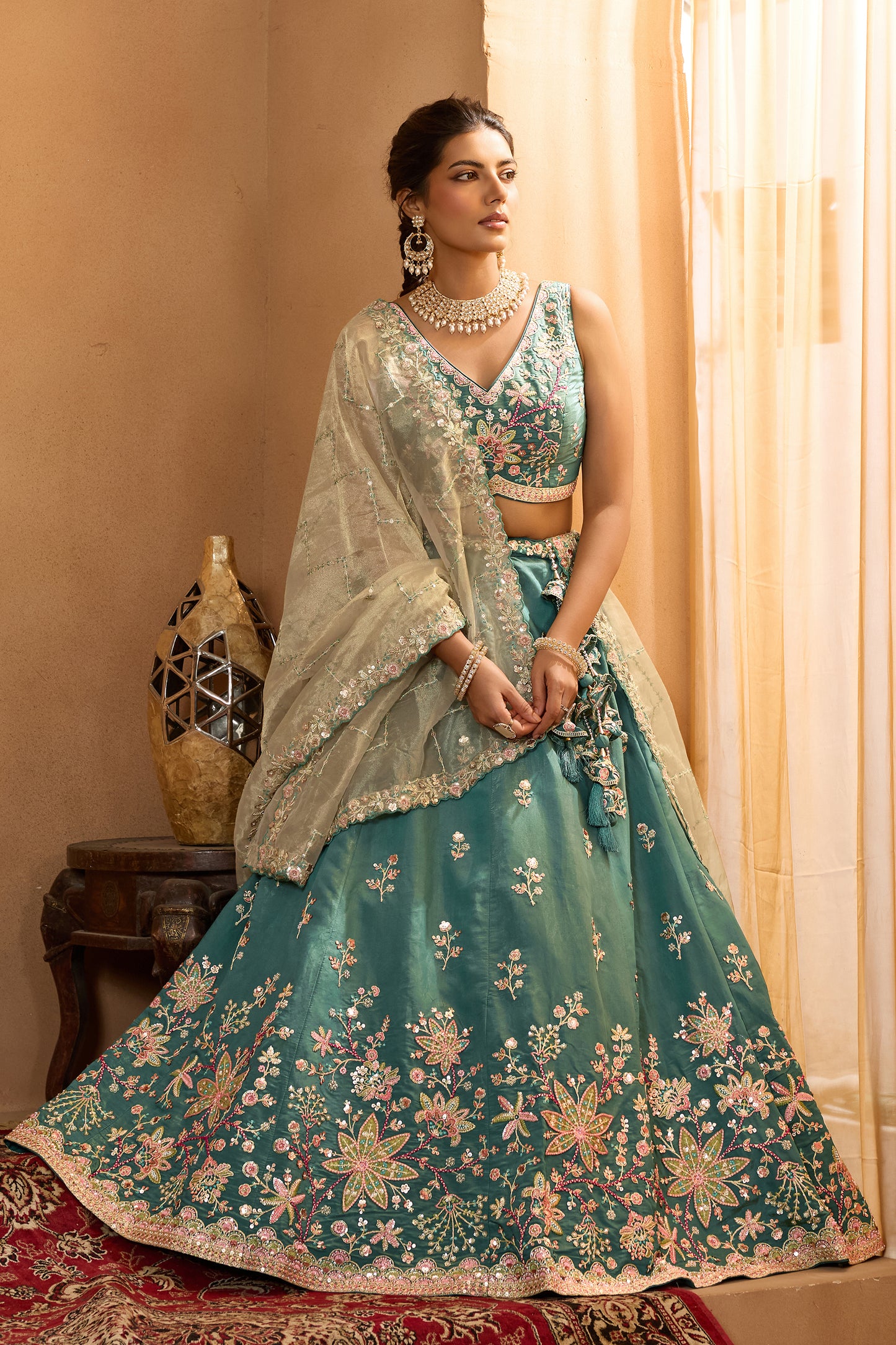 Teal Green Semi-Stitched Embroidered Georgette Lehenga