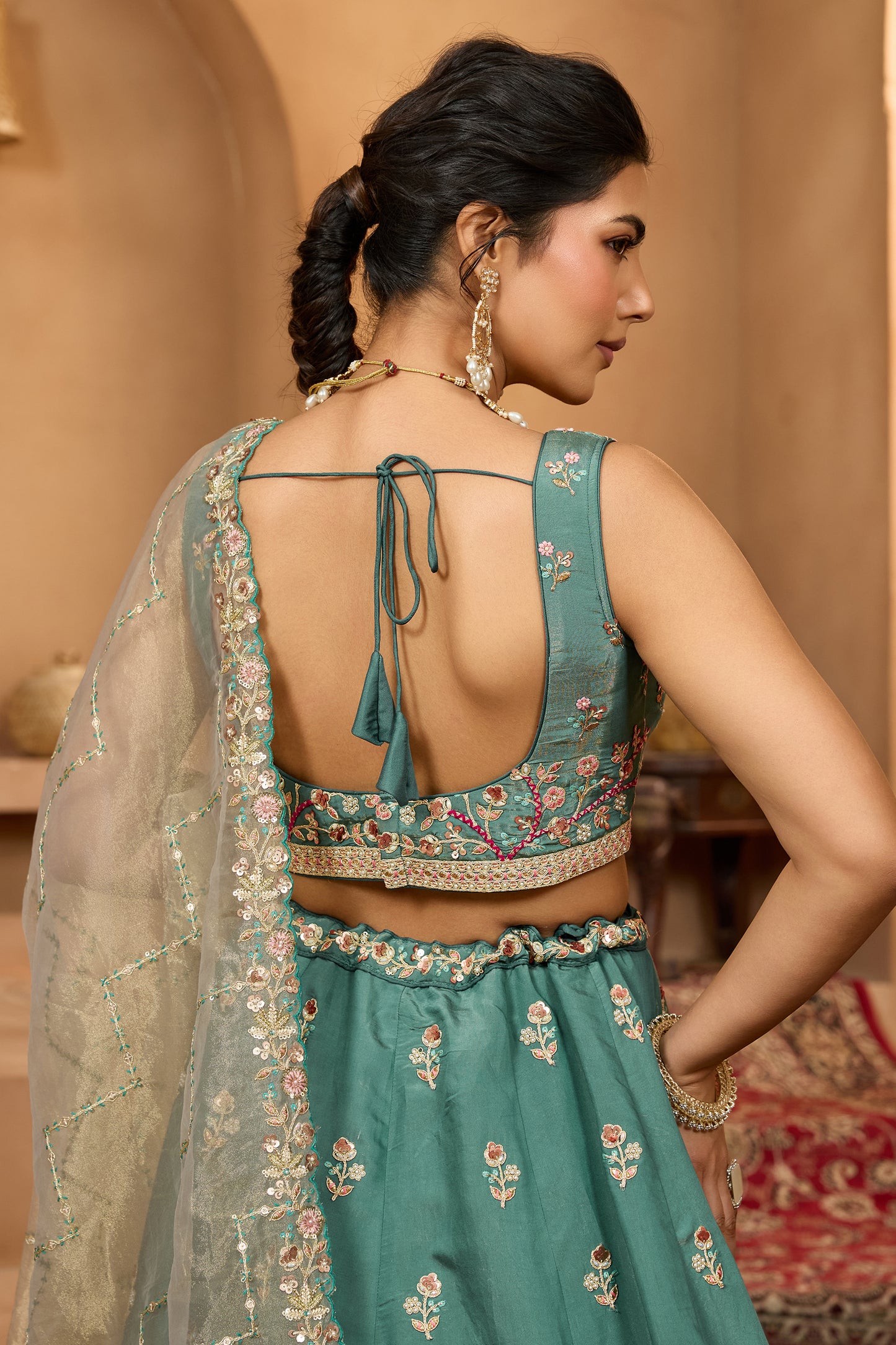 Teal Green Semi-Stitched Embroidered Georgette Lehenga